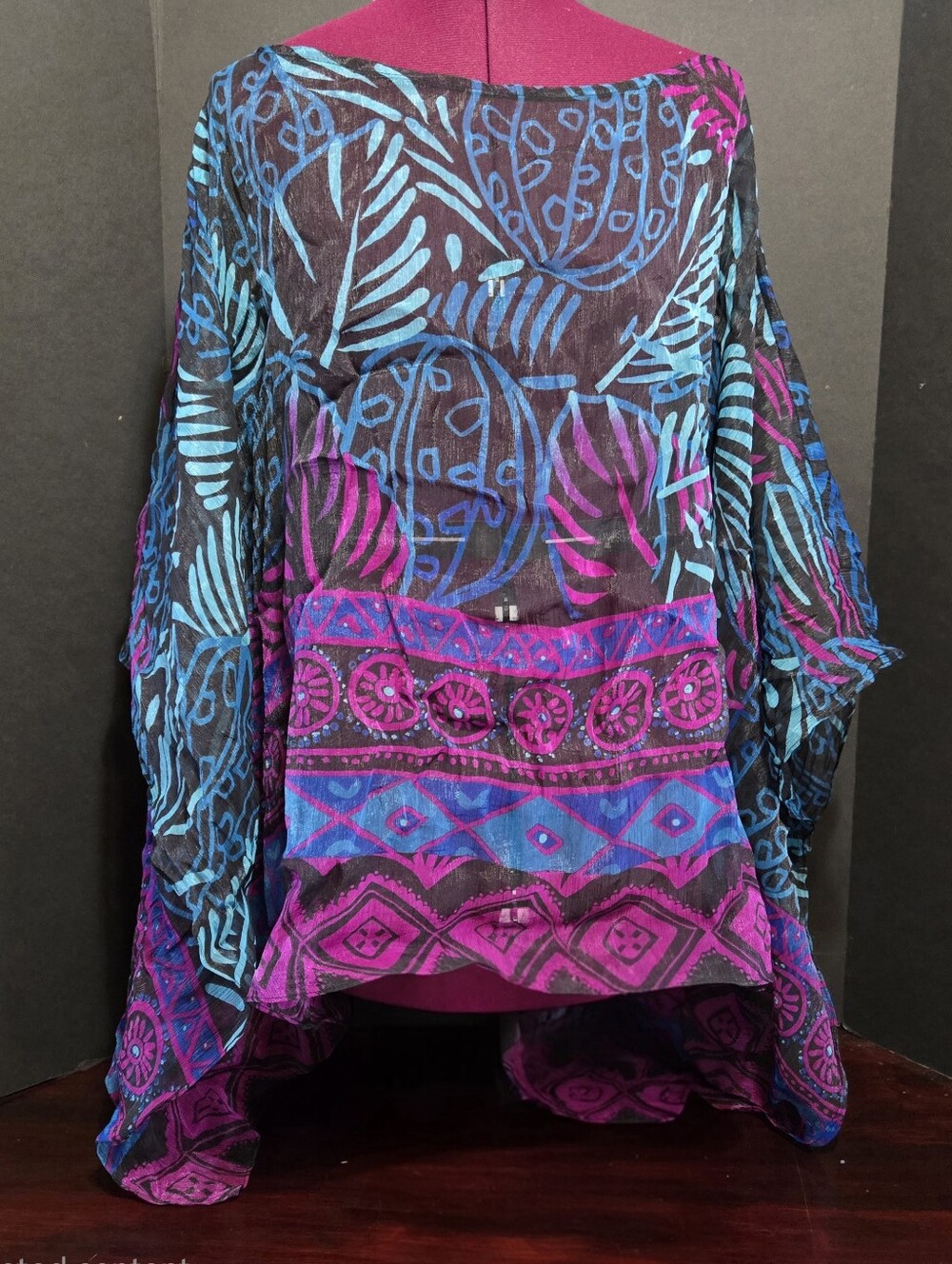 Beautiful Jeweled tones adorn this flowing 3/4 asemetrical sleeves Flowing semi - Picture 2 of 6